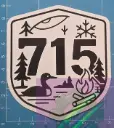 715 Northwoods Sticker – Wisconsin Cabin & Loon Vinyl Decal | 9×9 cm